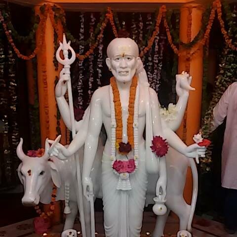 Imagen de Sai Baba de Shirdi como Dattatreya.